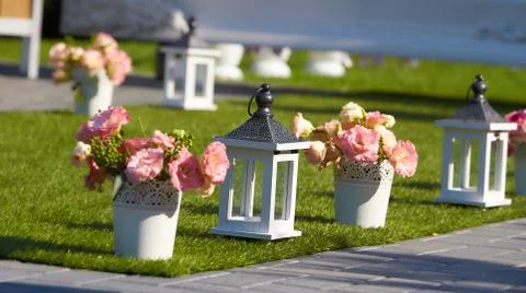 Wedding elements, guest book and mini bouquet flowers on table Stock Photos