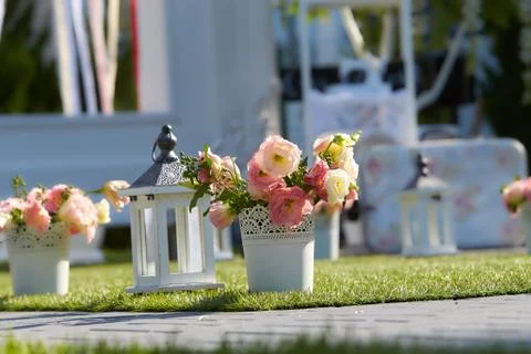 Wedding elements, guest book and mini bouquet flowers on table Stock Photos