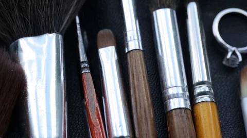 Wedding engagement Ring Brushes for Makeup artists Macro 100mm slider camera Stock Footage 114491816