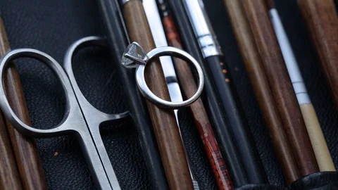 Wedding engagement Ring Scissors Brushes for Makeup artists Macro 100mm slider Stock Footage 114491856