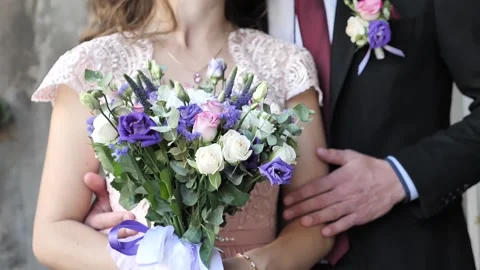Wedding flower composition in hands Stock Footage 151887200