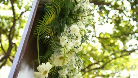 Wedding flowers on backdrop, handheld shot Stock Footage 104907323