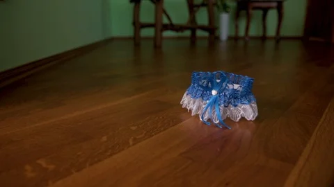 Wedding garter on th floor Stock Footage 91022992