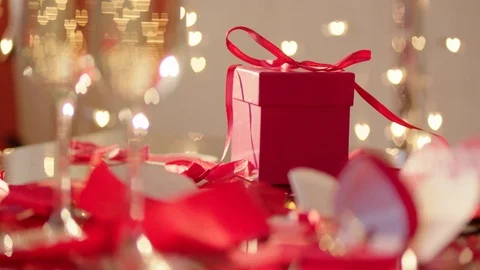 Wedding gift with red ribbon Stock Footage 71996126