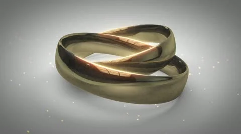 Wedding - Gold Rings Interlocking - Seamless Stock Footage 10907574
