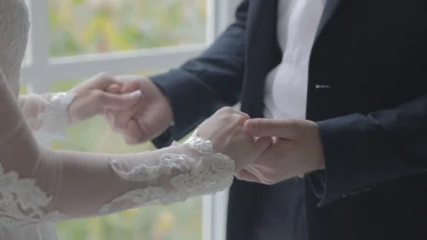 Wedding hands by the window Stock Footage 72384001