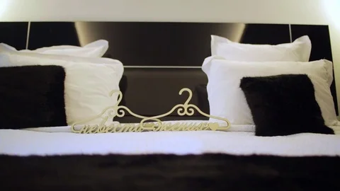Wedding hangers are on the bed Video stock 73344057