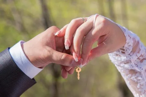 Wedding lock with hands Stock Photos