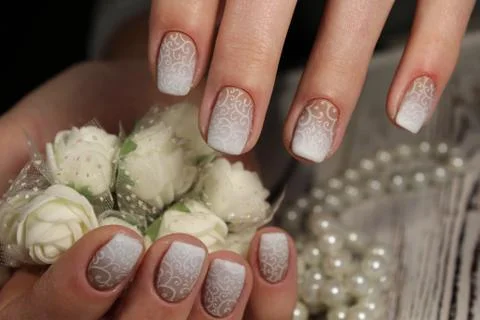 Wedding manicure for the bride Stock Photos