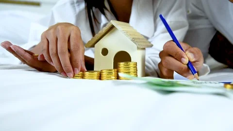 Wedding money saving finance solution planning wealth family. Hands of couple lo 動画素材 124740002