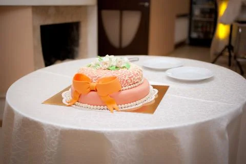 Wedding orange cake with ribbon Stock Photos