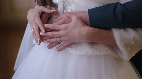 Wedding pair holding hands Stock Footage 61757643