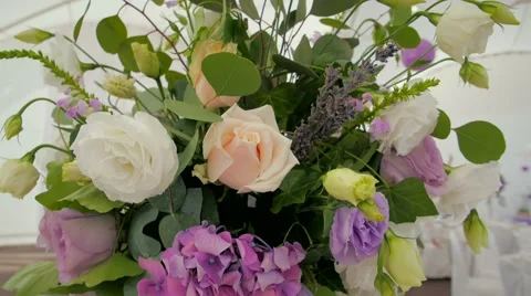 Wedding party flowers sliding camera white and violet bouquet Stock Footage 66241237