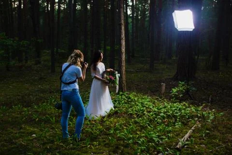 Wedding photographer using strobe and softbox to make close-up portraits Stock Photos