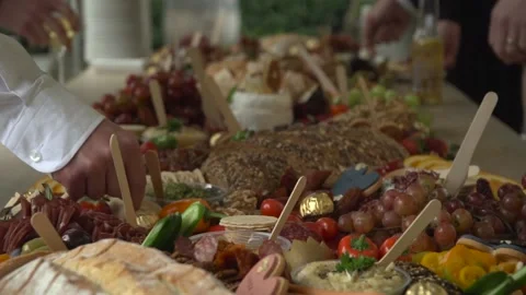 Wedding Platter bounty guests hands picking it off Stock Footage 197298480