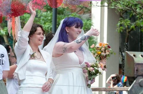 Wedding process in pop-up chapel  during Pride Parade Stock Photos