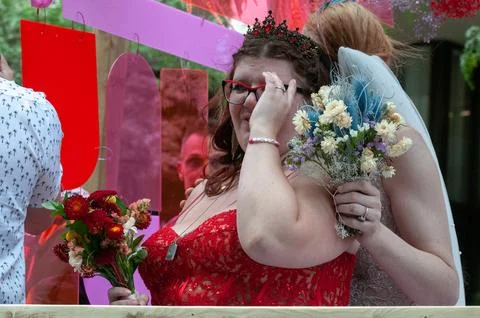 Wedding process in pop-up chapel  during Pride Parade Stock Photos