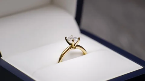 Wedding proposal diamond ring in a box being opened up. Engagement ring Stock Footage 341560334