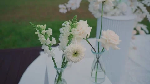 Wedding reception decor, fresh flower arrangements, a new design solution. Its Stock Footage 329094684