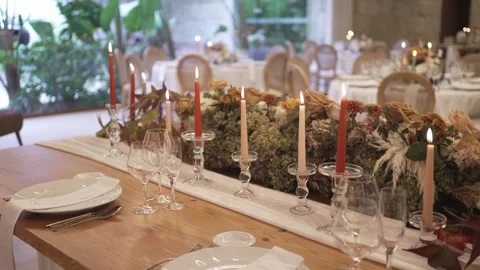 Wedding Reception Long Table with Candles and Moss Floral Centerpiece Runner Stock Footage 332947763