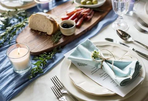 Wedding reception table setting plate with menu Stock Photos