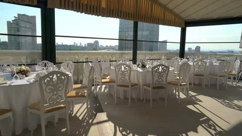 Wedding reception tables, place settings - Nuptial Banquet and Decorated Chairs Stock Footage 339842070