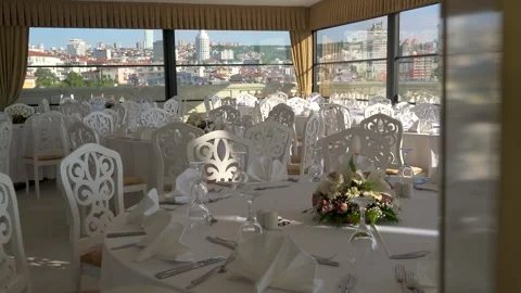 Wedding reception tables, place settings and empty chairs - Marriage Reception Stock Footage 339842096