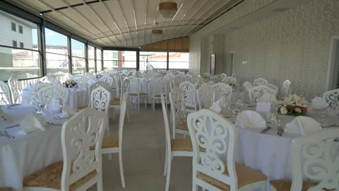 Wedding reception tables, place settings - Nuptial Banquet and Decorated Tables Stock Footage 340522566