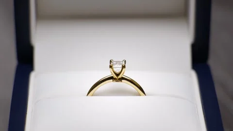 Wedding ring in a box being opened up. Engagement ring revealed, marriage Stock Footage 341561779