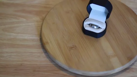 Wedding ring in box spinning with copy space Stock Footage 236595497