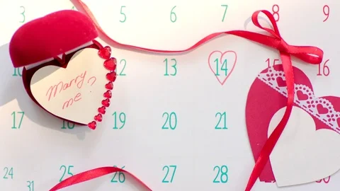 Wedding ring gift box opened on Valentine's day Stock Footage 71572486