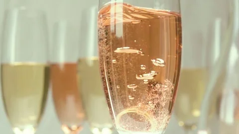 Wedding ring in a glass slow mo Stock Footage 72274415