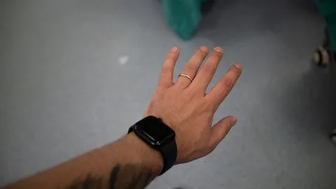 Wedding ring. Gold ring on man's finger Stock Photos