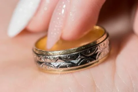 Wedding ring on hand Stock Photos