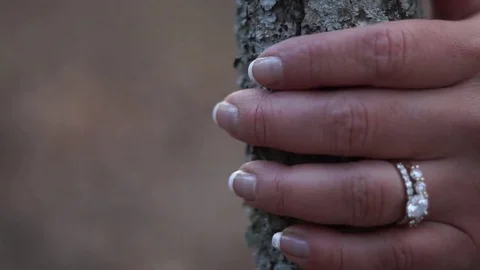Wedding Ring Hand on Tree in the Woods (Slow Mo) Video stock 82361937