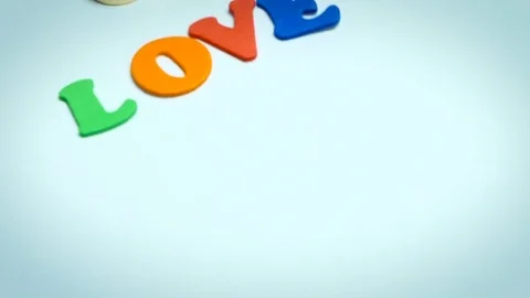 Wedding ring with letters love Stock Footage 72859366