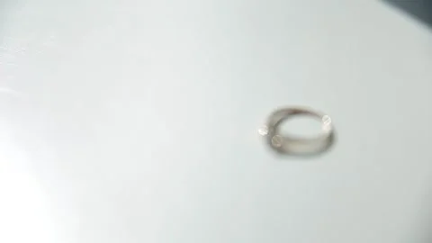 The wedding ring lies on the windowsill in the sunshine. Stock Footage 249010602