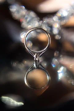 Wedding ring on a mirror Stock Photos