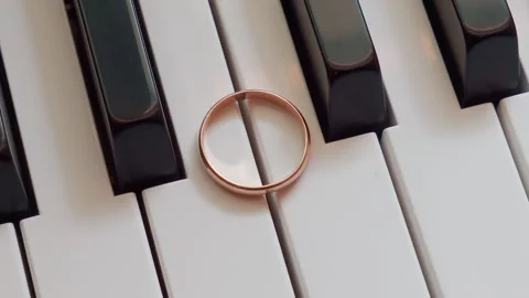 Wedding Ring On Piano Keys Slow Zoom Out Stock-Footage 342706580