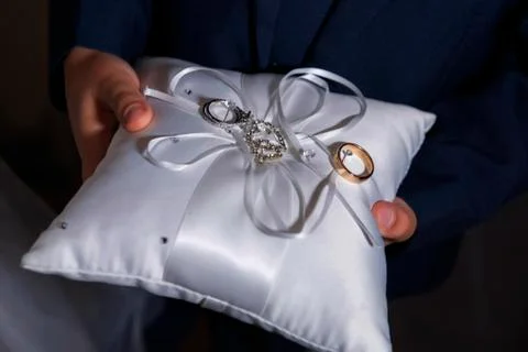 Wedding ring with pillow Stock Photos