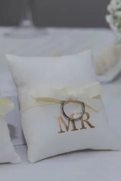 Wedding ring with pillow Stock Photos
