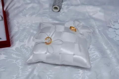 Wedding ring with pillow Stock Photos
