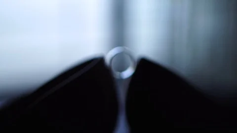 Wedding ring put on the bride’s wedding shoes. Stock Footage 129114568