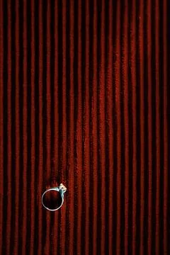 Wedding ring on red background Stock Photos