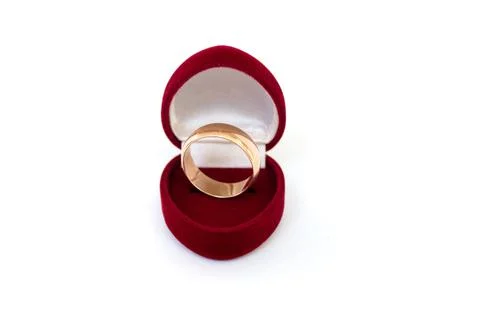 Wedding ring in red case on white isolated background Stock Photos