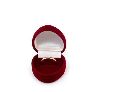 Wedding ring in red case on white isolated background Stock Photos