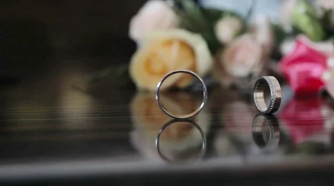 Wedding ring rolling Stock Footage 56844301