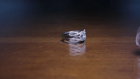 Wedding Ring shot spinning Stock Footage 87252432
