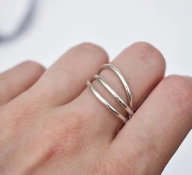 Wedding ring on a white background. Close-up. Stock Photos