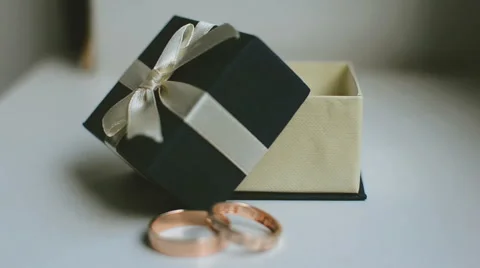 Wedding rings and a box Stock Footage 59734085